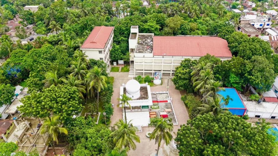 Aerial image showing the lush surroundings and architecture of Lalon Shah Mausoleum in Kushtia.