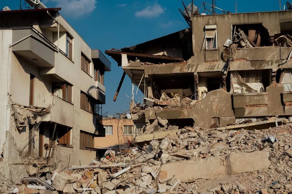 Damaged buildings from earthquake in Antakya, Turkey. Structural collapse and debris.