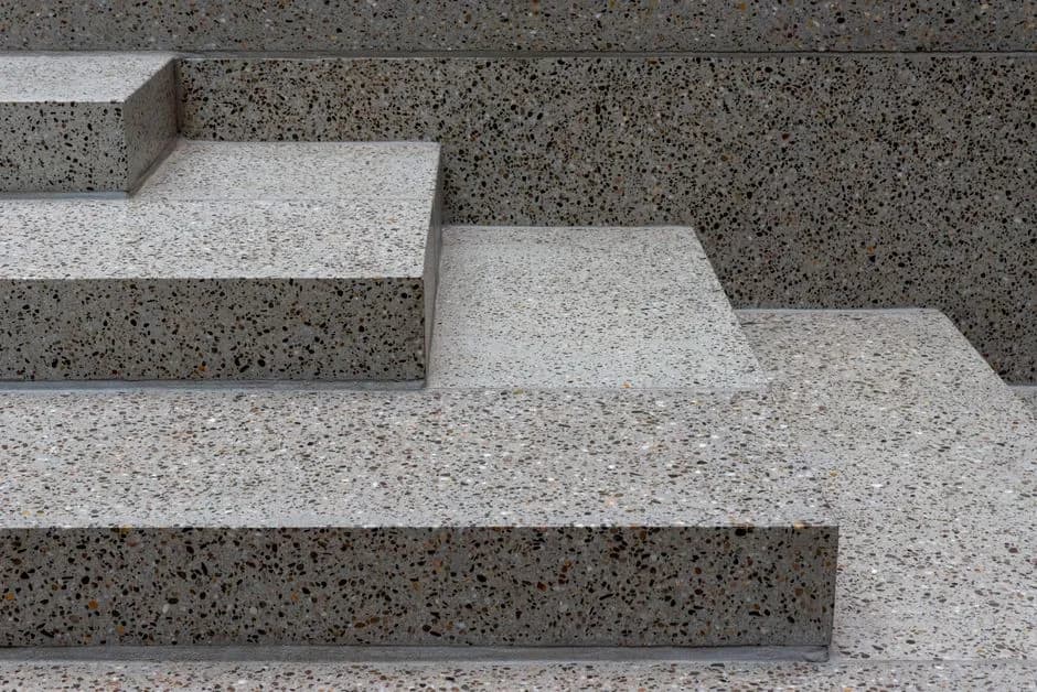 A detailed view of terrazzo stone steps showcasing modern architecture and texture.